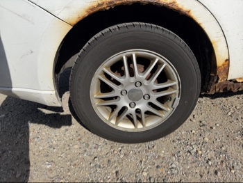 2008 ford focus ses-sedan with 288350 miles for sale near Elk River, Minnesota 106610_14_rear_pass_wheel.jpg