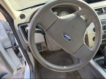 2008 ford focus ses-sedan with 288350 miles for sale near Elk River, Minnesota 106610_36_steering_wheel.jpg