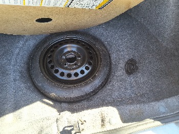 2003 buick century custom with 90479 miles for sale near Elk River, Minnesota 106612_27_spare_tire.jpg