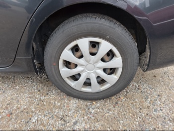 2010 toyota corolla le-4-speed-at with 170238 miles for sale near Elk River, Minnesota 106616_13_rear_drv_wheel.jpg