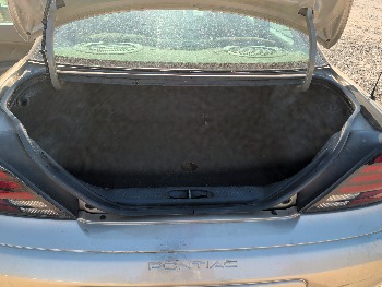 2004 pontiac grand-am se1-sedan with 91565 miles for sale near Elk River, Minnesota 106619_26_trunk.jpg