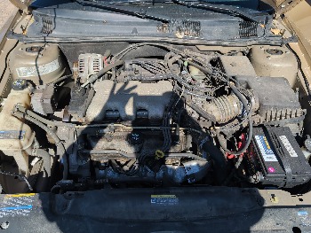 2004 pontiac grand-am se1-sedan with 91565 miles for sale near Elk River, Minnesota 106619_49_engine_bay.jpg