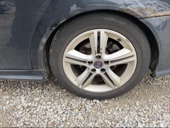 2009 saab 9-3 2.0t-touring with 207829 miles for sale near Elk River, Minnesota 106626_13_rear_drv_wheel.jpg