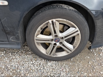 2009 saab 9-3 2.0t-touring with 207829 miles for sale near Elk River, Minnesota 106626_15_front_pass_wheel.jpg