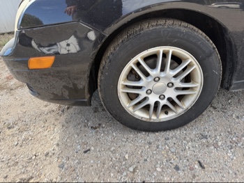 2006 ford focus zx4-s with 155179 miles for sale near Elk River, Minnesota 106630_12_drv_front_wheel.jpg