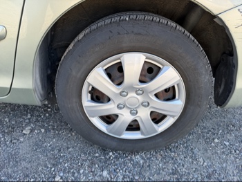 2009 toyota sienna ce-fwd-7-passenger with 179777 miles for sale near Elk River, Minnesota 106631_13_rear_drv_wheel.jpg