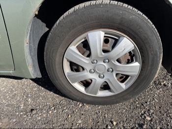2009 toyota sienna ce-fwd-7-passenger with 179777 miles for sale near Elk River, Minnesota 106631_15_front_pass_wheel.jpg