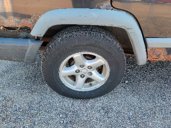 1998 jeep cherokee sport-4-door-4wd with 185611 miles for sale near Elk River, Minnesota 106637_14_rear_pass_wheel.jpg
