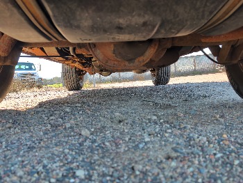 1998 jeep cherokee sport-4-door-4wd with 185611 miles for sale near Elk River, Minnesota 106637_19_undercar_rear.jpg