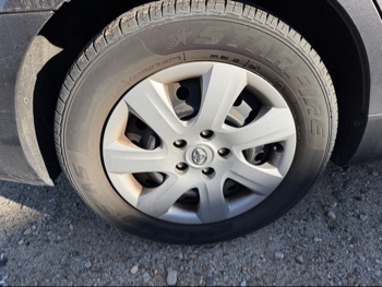 2011 toyota camry base-6-spd-at with 219492 miles for sale near Elk River, Minnesota 106639_14_rear_pass_wheel.jpg