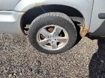 2005 dodge caravan sxt with 132608 miles for sale near Elk River, Minnesota 106640_14_rear_pass_wheel.jpg