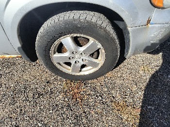 2005 dodge caravan sxt with 132608 miles for sale near Elk River, Minnesota 106640_15_front_pass_wheel.jpg