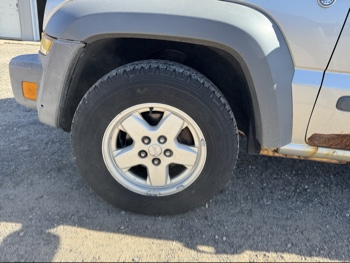 2005 jeep liberty sport-4wd with 175646 miles for sale near Elk River, Minnesota 106643_12_drv_front_wheel.jpg