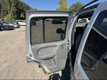 2005 jeep liberty sport-4wd with 175646 miles for sale near Elk River, Minnesota 106643_25_drv_rear_door_panel.jpg