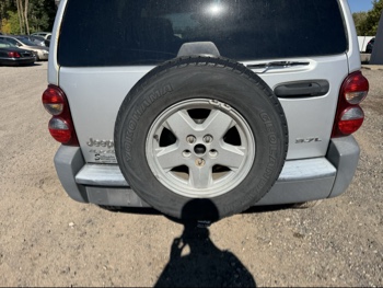2005 jeep liberty sport-4wd with 175646 miles for sale near Elk River, Minnesota 106643_27_spare_tire.jpg