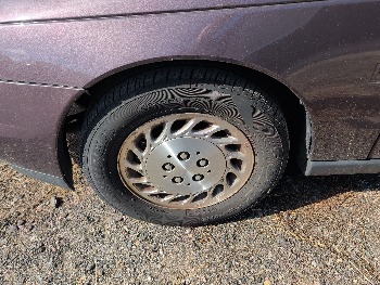 2000 saturn ls ls2 with 145375 miles for sale near Elk River, Minnesota 106652_12_drv_front_wheel.jpg