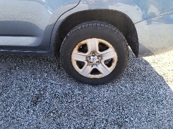2010 toyota rav4 base-i4-4wd with 209322 miles for sale near Elk River, Minnesota 106656_13_rear_drv_wheel.jpg