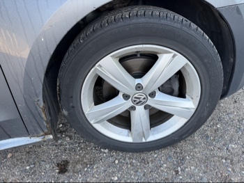 2012 volkswagen passat 2.5l-se-mt with 176667 miles for sale near Elk River, Minnesota 106657_15_front_pass_wheel.jpg