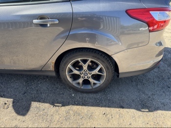 2013 ford focus se-sedan with 242471 miles for sale near Elk River, Minnesota 106659_13_rear_drv_wheel.jpg