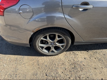 2013 ford focus se-sedan with 242471 miles for sale near Elk River, Minnesota 106659_14_rear_pass_wheel.jpg
