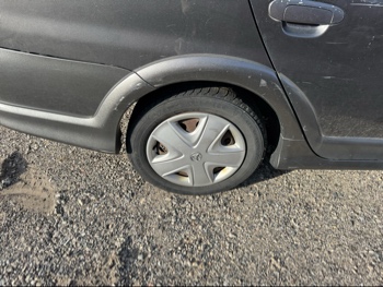 2003 toyota echo 4-door-sedan with 222883 miles for sale near Elk River, Minnesota 106664_14_rear_pass_wheel.jpg