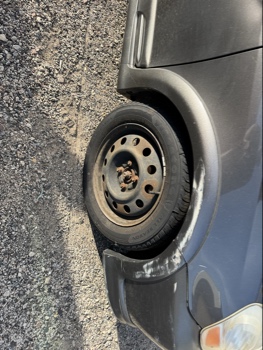 2003 toyota echo 4-door-sedan with 222883 miles for sale near Elk River, Minnesota 106664_15_front_pass_wheel.jpg