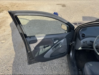 2003 toyota echo 4-door-sedan with 222883 miles for sale near Elk River, Minnesota 106664_23_driver_door_panel.jpg