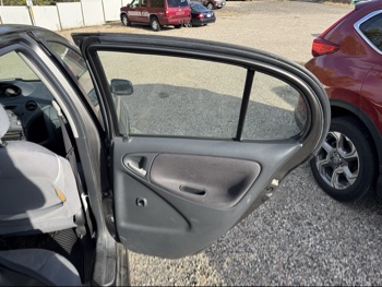 2003 toyota echo 4-door-sedan with 222883 miles for sale near Elk River, Minnesota 106664_30_pass_rear_door_panel.jpg