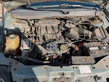 2006 ford taurus sel with 151678 miles for sale near Elk River, Minnesota 106677_48_windshield_vin_plate.jpg