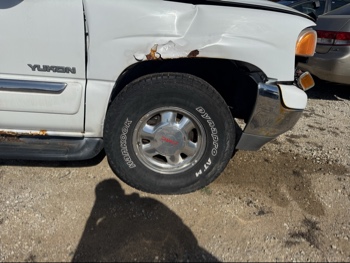 2002 gmc yukon 4wd with 268752 miles for sale near Elk River, Minnesota 106679_15_front_pass_wheel.jpg