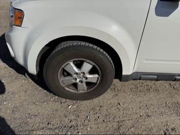 2009 ford escape xlt-fwd-v6 with 165967 miles for sale near Elk River, Minnesota 106684_12_drv_front_wheel.jpg