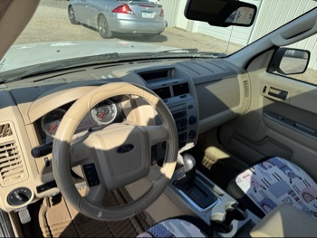 2009 ford escape xlt-fwd-v6 with 165967 miles for sale near Elk River, Minnesota 106684_33_dash_from_driver.jpg