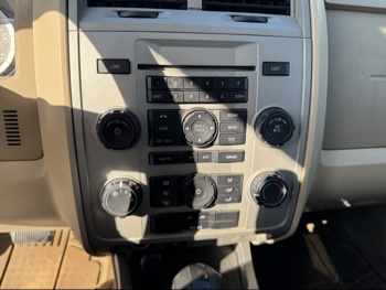 2009 ford escape xlt-fwd-v6 with 165967 miles for sale near Elk River, Minnesota 106684_39_radio_closeup.jpg