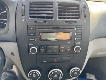 2007 kia spectra lx with 188719 miles for sale near Elk River, Minnesota 106695_39_radio_closeup.jpg