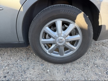 2009 buick lacrosse cx with 28748 miles for sale near Elk River, Minnesota 106702_13_rear_drv_wheel.jpg