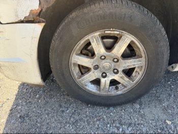 2009 chrysler town-and-country touring with 156827 miles for sale near Elk River, Minnesota 106715_12_drv_front_wheel.jpg