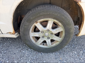 2009 chrysler town-and-country touring with 156827 miles for sale near Elk River, Minnesota 106715_13_rear_drv_wheel.jpg