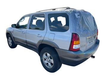 2004 mazda tribute lx-4wd with 197487 miles for sale near elk-river, minnesota 1dfad690f70e4ddbaf6c01c081729719.jpg