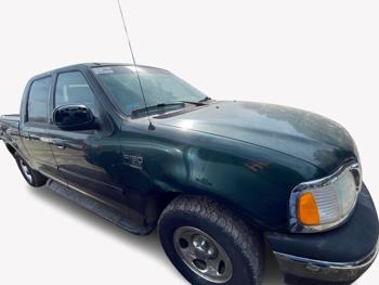 2002 ford f-150 with 153464 miles for sale near elk-river, minnesota 23c92323545c41d381fa176bb271f113.jpg