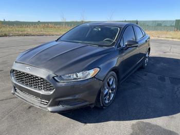 2016 Ford Fusion SE sold at auction in Elk River, Minnesota