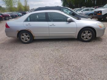 2006 honda accord lx-se-sedan-at with 168218 miles for sale near elk-river, minnesota 7e9da396978d43609d1b77e61a078813.jpg