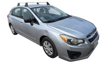 2013 subaru impreza base-5-door with 166153 miles for sale near elk-river, minnesota 106296_07_pass_front_corner.jpg