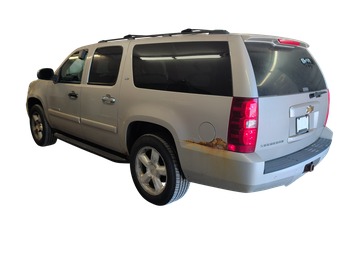 2007 chevrolet suburban ls-1500-4wd with 182367 miles for sale near elk-river, minnesota 106439_03_rear_driver_corner.jpg