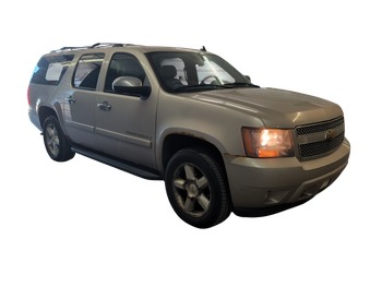 2007 chevrolet suburban ls-1500-4wd with 182367 miles for sale near elk-river, minnesota 106439_07_pass_front_corner.jpg