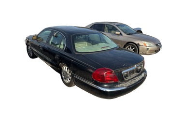 2002 lincoln continental base for sale near Elk River, Minnesota 106475_03_rear_driver_corner.jpg