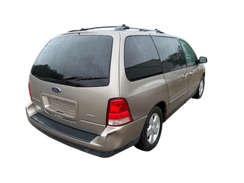 2004 ford freestar lx-sport with 163395 miles for sale near elk-river, minnesota 106532_05_pass_rear_corner.jpg