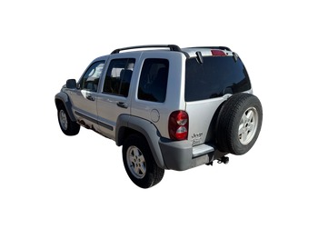 2005 jeep liberty sport-4wd with 175646 miles for sale near Elk River, Minnesota 106643_03_rear_driver_corner.jpg