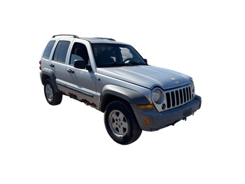 2005 jeep liberty sport-4wd with 175646 miles for sale near Elk River, Minnesota 106643_07_pass_front_corner.jpg