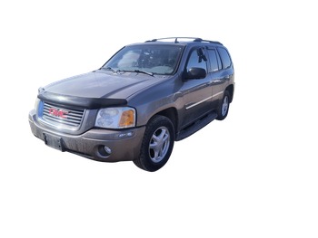 2006 gmc envoy sle-4wd with 210208 miles for sale near Elk River, Minnesota 106796_01_driver_front_corner.jpg